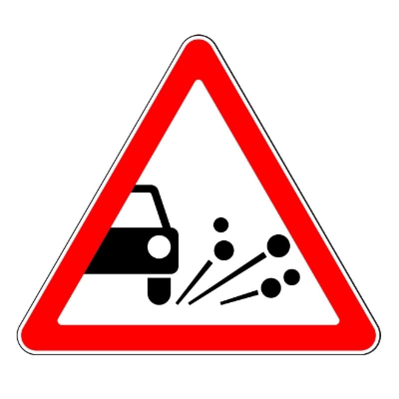 Дорожный знак 1.18 «Выброс гравия»